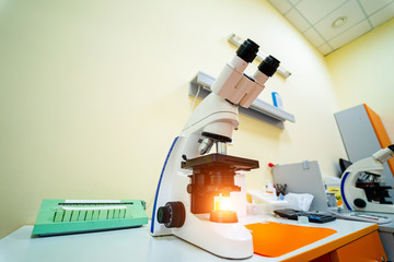 Horizontal image of the microscope. Ready for research. Bacteria and viruses identification. Close...