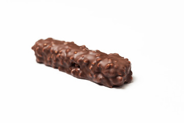 chocolate bar with dark brown chocolate with nuts on a white background.