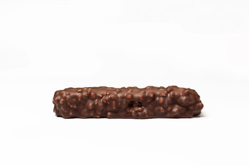 chocolate bar with dark brown chocolate with nuts on a white background.