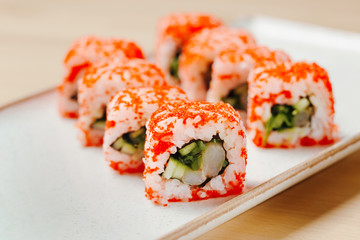 Sushi set roll california shrimp. Delivery food on qurantine. Rice, nori, tiger prawn, cucumber, avocado, spice sauce, masago caviar.