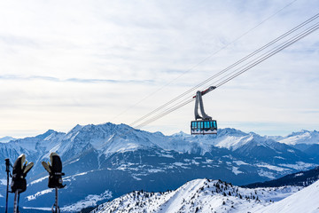 Ski lift on the way to the top of a mountain