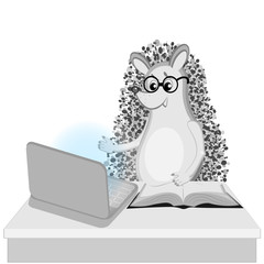 A hedgehog sits at a table on which stands a turned-on laptop and lies an open book.