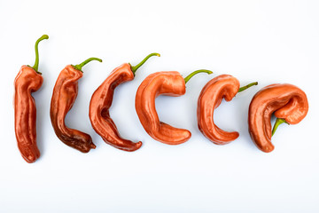 red peppers on a white background