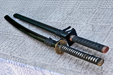 Two japanase swords on the table