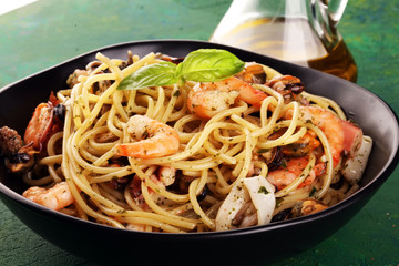 Seafood pasta. Dish with mediterranean frutti di mare on table