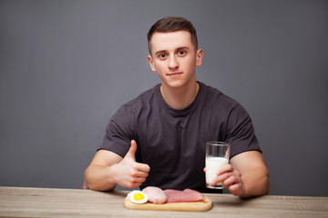 Man consumes a high-protein meal of meat and milk
