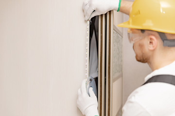 Electrician installing mounting tape LED strip light decorative lighting