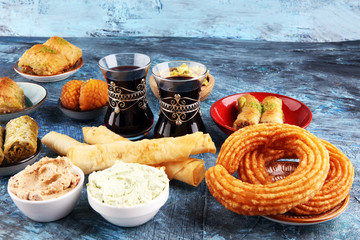 Middle eastern or arabic dishes. Turkish Dessert Baklava with pistachio. Halal food.