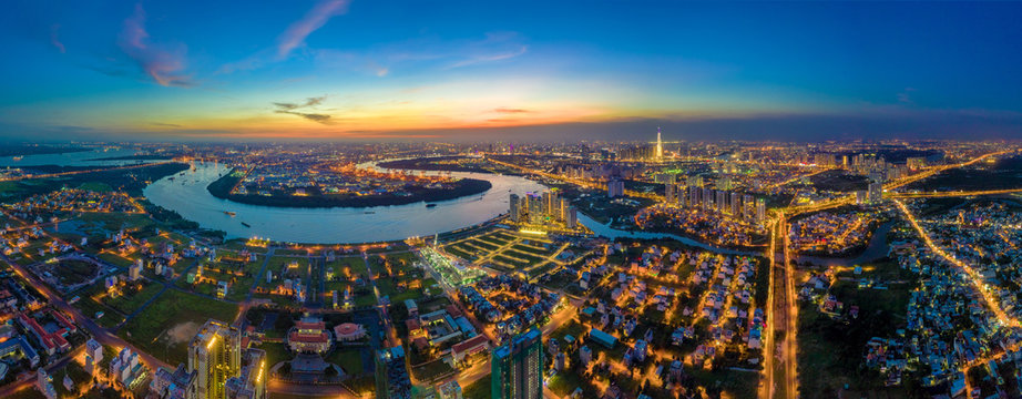 Top view aerial of Tan Thuan Export Processing Zone and center Ho Chi Minh City, Vietnam  with development buildings, transportation, energy power infrastructure. View from District 2