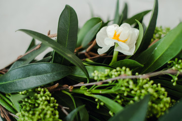 bouquet of daffodils with a brooch