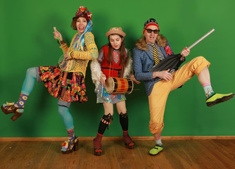 A fun family of freaks portrays a musical group