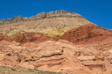 Fototapeta premium Colored, layered mountains of Aktau in the reserve of Kazakhstan.