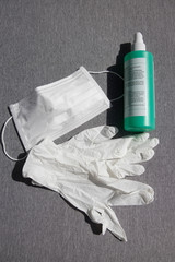 Hand sanitizer, face mask and gloves for protection and staying healthy