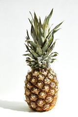 
Ripe juicy pineapple fruit on a white background.