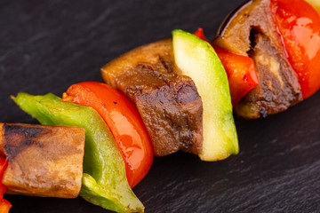 Shashlik of vegetables, tomatoes, marrows and sweet pepper, grilled