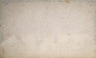 Antique papers. Old aged, stained, vintage and ruined pages. Books from the 1800s.