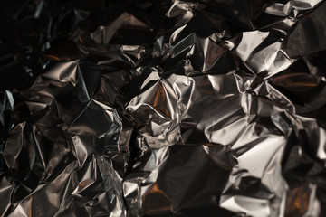 Full frame take of a sheeT of crumpled silver aluminum foil