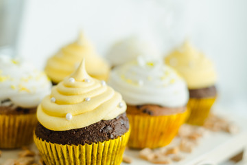 cake with hares and a white and yellow cake on the table
