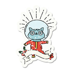 grunge sticker of tattoo style cat in astronaut suit