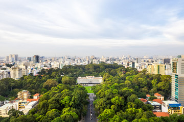 Fototapeta na wymiar Top view aerial of Independence Palace or Reunification Palace and center Ho Chi Minh City, Vietnam with development buildings, transportation, energy power infrastructure.
