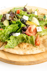 tortilla with fresh salad vegetables isolate on a white background