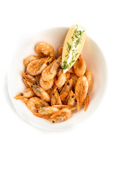 prawns with lemon on isolate white background
