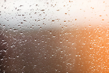 Drops of rain on the window. Water on the glass. Running drops. Background conceptual.