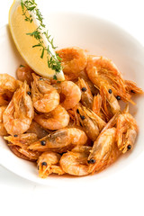 prawns with lemon on isolate white background
