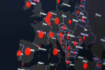 COVID-19 coronavirus pandemic on the map of Europe with red dots of infection centers.