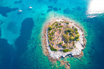 Aerial view of lonely island in Gradina bay, sailing destination on island Korcula