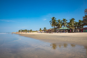 Beach near the Senegambia hotel strip in the Gambia, West Africa. - obrazy, fototapety, plakaty