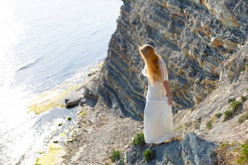 blonde model on the beach at the summer 