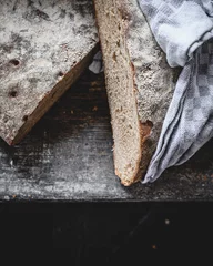 Rollo Brot Top view of freshly baked bread from the baker's oven on a black background  © Tobi