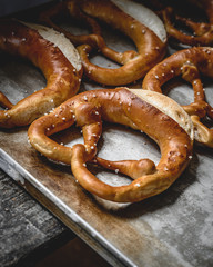 Side view of freshly baked pretzels, which come directly from the oven