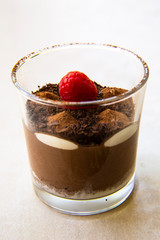Chocolate moose with raspberry in the cup