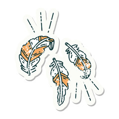Naklejka premium grunge sticker of tattoo style feathers floating