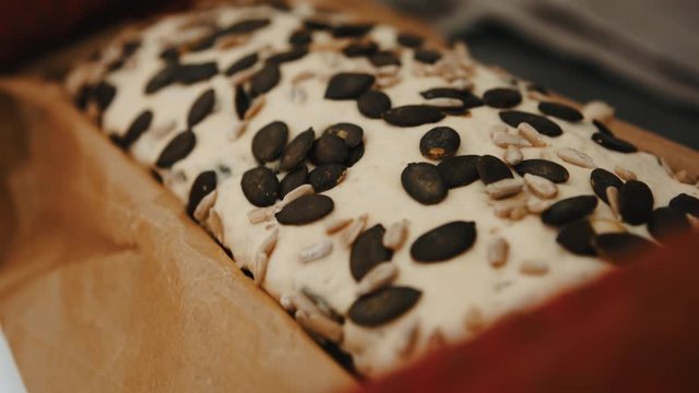 Homemade bread with pumpking seed on the kitchen counter. Close up