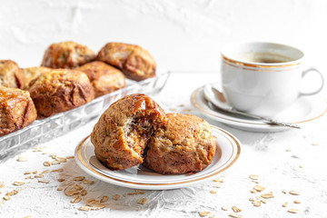 brown banana toffie muffins on a white background