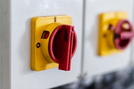 High Voltage Electrical Switch Hanging On The Wall.