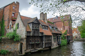 Fototapeta na wymiar View of medieval houses in old historical town in Bruges, Belgium.