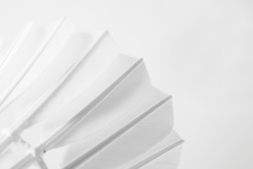 Shuttlecock feathers macro against white