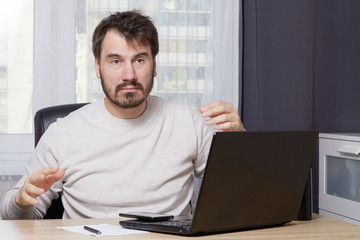 a man looking for work online unemployment concept