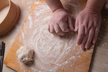 dumplings, ravioli, rolling pin, dough, board, hand, indoors, woman, female, motion, healthy, table, ingredient, organic, delicious, bowl, meal, cooking, culinary, bread, kitchen, lifestyles, slice, k