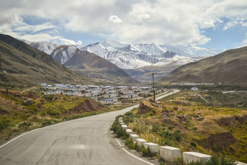 Empty road near Irkeshtam town, along the Silk Road, Kyrgyzstan