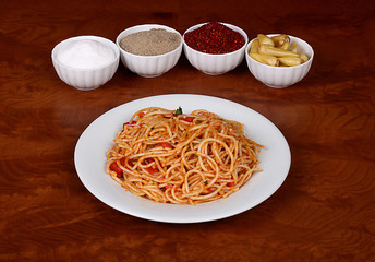 perfect italian food pasta on white plate on wooden table