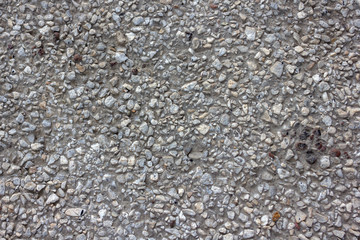 concrete background with inclusions of small pebbles