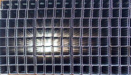 Obraz premium the square profile is folded into a stack. from the end, the light goes into perspective.