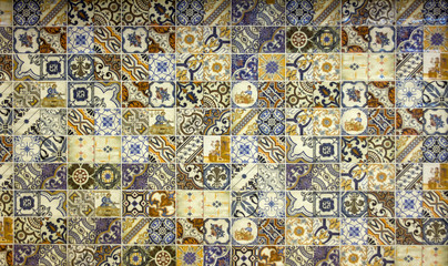 wall of multicolored tiles with ethnic patterns pottery retro