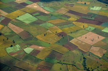 Aerial view from the plane on colorful fields in myanmar