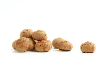 Homemade peanut cookies on white background, traditional Chinese new year snack.